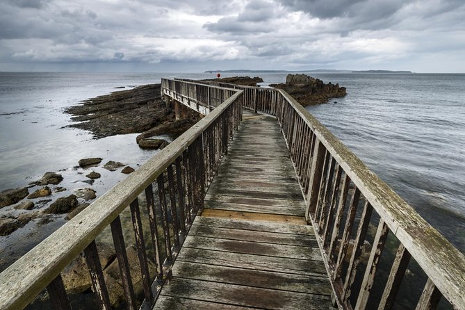 2-Day 'Game of Thrones' Rail Tour from Dublin Incl. Belfast and Giant's Causeway - Cushendun caves: the story behind the walk