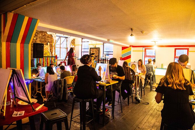 Drink & Draw: Paint A Masterpiece - What you get in your hands: canvas, apron, and paint