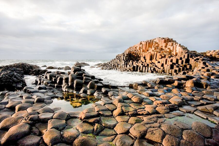 Dublin: Giants Causeway, Dark Hedges, Dunluce & Belfast Tour - Dunluce Castle ruins: why the 5-minute stop still works