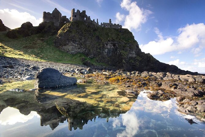 Dublin to Belfast Titanic, Dunluce Castle & Giant's Causeway Tour - Dunluce Castle: 30 Minutes of Cliff-Edge Ruins and Big Photo Energy