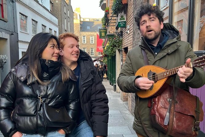 Dublin Traditional Irish Music Walking Tour with Live Performance - Grattan Bridge and the River Liffey: seahorse lanterns and easy city views
