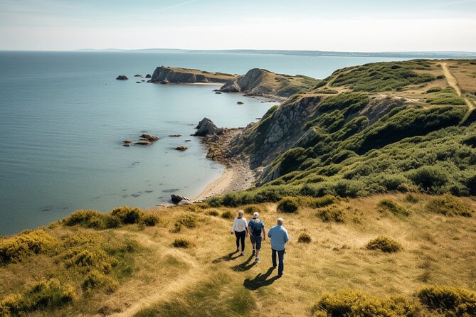 Private Howth Coastal Walk - Great Baily Lighthouse overlook: views plus stories with darker edges