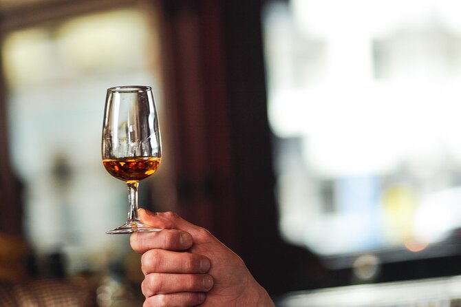 Sip and Stroll Whiskey History Walking Tour in Dublin - Stop 1: St. Patrick’s Tower and the George Roe Distilling Connection